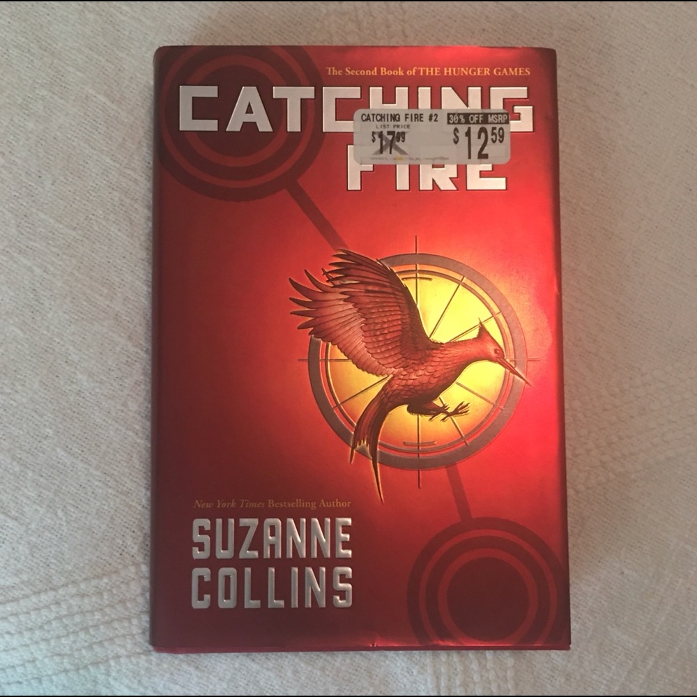 Catching Fire Hardback by Suzanne Collins